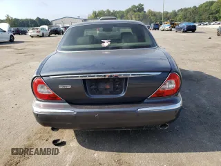 2004 Jaguar XJ with VIN SAJWA71CX4SG32785, listed as a Copart auction lot 69792134 with 183,705 mi miles and Non Repairable. Bid and sale history available at carsss.com. Image 6.