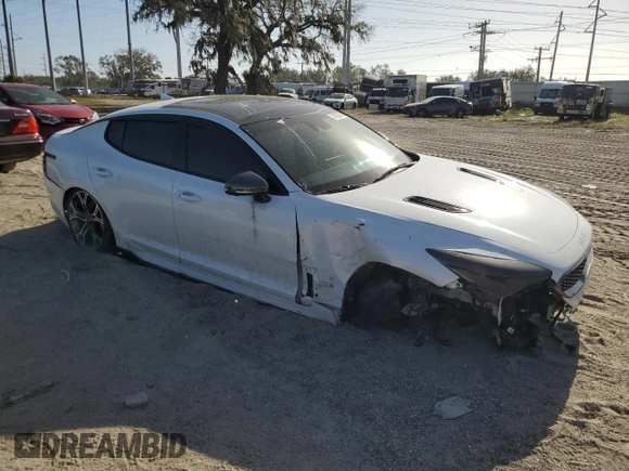 2021 Kia Stinger GT2 with VIN KNAE55LC1M6089121, listed as a Copart auction lot 74823434 with 25,009 mi miles and Salvage Title. Bid and sale history available at carsss.com. Image 4.