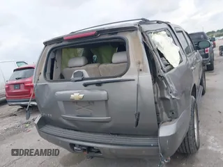 2007 Chevrolet Tahoe LT z VIN 1GNFC13J77R113842, wystawiony jako IAAI lot #42293559 z przebiegiem 288 926 mil mil oraz . Historia ofert i sprzedaży dostępna na DreamBid. Obrazek 16.