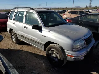 2003 Suzuki Vitara z VIN 2S3TE52V936103483, wystawiony jako Copart lot #82235884 z przebiegiem 173 354 mil mil oraz Szkody całkowita. Historia ofert i sprzedaży dostępna na DreamBid. Obrazek 4.
