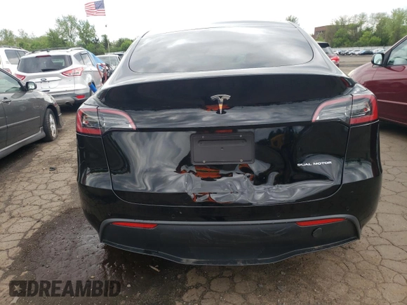 2022 Tesla Model Y Long Range z VIN 7SAYGDEEXNA008898, wystawiony jako Copart lot #54915445 z przebiegiem 35 467 mil mil oraz Szkoda całkowita • Salvage title. Historia ofert i sprzedaży dostępna na DreamBid. Obrazek 6.