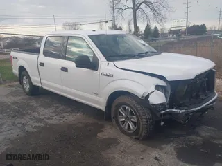 2015 Ford F-150 XLT w/HD Payload Pkg with VIN 1FTFW1EG3FFC39052, listed as a IAAI auction lot 41046847 with 151,061 mi miles. Bid and sale history available at carsss.com. Image 1.