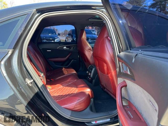 2018 Audi S6 Premium Plus z VIN WAUFFAFC6JN000859, wystawiony jako Copart lot #58193725 z przebiegiem 120 327 mil mil oraz Tytuł czysty. Historia ofert i sprzedaży dostępna na DreamBid. Obrazek 6.