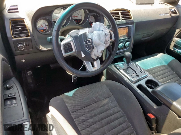2014 Dodge Challenger R/T Plus z VIN 2C3CDYBT0EH122467, wystawiony jako Copart lot #58392365 z przebiegiem 136 793 mil mil oraz Szkoda całkowita • Salvage title. Historia ofert i sprzedaży dostępna na DreamBid. Obrazek 8.