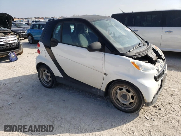 2014 Smart fortwo Pure z VIN WMEEJ3BA8EK742332, wystawiony jako Copart lot #44252235 z przebiegiem 97 980 mil mil oraz Czysty tytuł • Clean title. Historia ofert i sprzedaży dostępna na DreamBid. Obrazek 4.