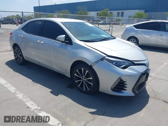 2019 Toyota Corolla L with VIN 5YFBURHE5KP877691, listed as a IAAI auction lot 42108591 with 85,813 mi miles and . Bid and sale history available at DreamBid. Image 1.