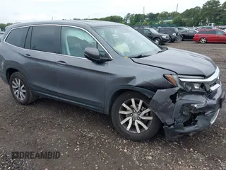 2019 Honda Pilot EX-L with VIN 5FNYF6H5XKB096065, listed as a IAAI auction lot 42631239 with 171,768 mi miles and . Bid and sale history available at DreamBid. Image 1.