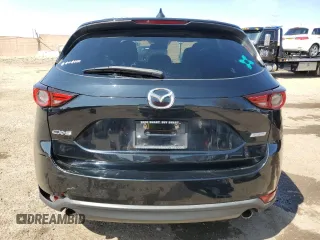 2018 Mazda CX-5 Grand Touring with VIN JM3KFADM9J1336792, listed as a Copart auction lot 52209435 with 107,852 mi miles and Salvage Title. Bid and sale history available at DreamBid. Image 6.