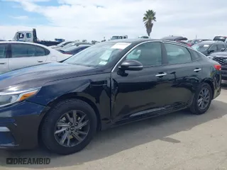 2019 Kia Optima S with VIN 5XXGT4L34KG296953, listed as a IAAI auction lot 42014999 with 64,968 mi miles. Bid and sale history available at carsss.com. Image 14.