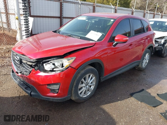 2016 Mazda CX-5 Sport with VIN JM3KE2BY3G0754391, listed as a IAAI auction lot 41719461 with 79,130 mi miles. Bid and sale history available at carsss.com. Image 2.