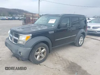 2007 Dodge Nitro SXT with VIN 1D8GU28K27W569672, listed as a IAAI auction lot 41868853 with 179,145 mi miles and . Bid and sale history available at carsss.com. Image 2.