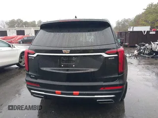 2022 Cadillac XT6 Premium Luxury z VIN 1GYKPDRS8NZ161368, wystawiony jako IAAI lot #41115620 z przebiegiem 140 819 mil mil oraz . Historia ofert i sprzedaży dostępna na DreamBid. Obrazek 16.