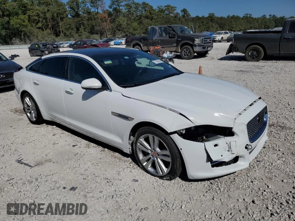 2016 Jaguar XJ Portfolio with VIN SAJWA2G79G8W00955, listed as a Copart auction lot 77650194 with 60,515 mi miles and Clean title. Bid and sale history available at DreamBid. Image 4.