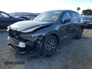 2018 Mazda CX-5 Grand Touring with VIN JM3KFADM8J1330353, listed as a Copart auction lot 54752325 with 96,577 mi miles and Salvage Title. Bid and sale history available at DreamBid. Image 1.