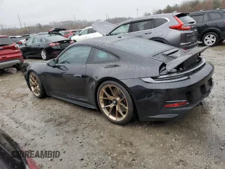 2023 Porsche 911 GT3 with VIN WP0AC2A94PS270884, listed as a Copart auction lot 80861614 with 43,830 mi miles and Salvage Title. Bid and sale history available at carsss.com. Image 2.