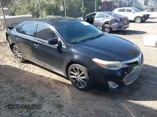 2015 Toyota Avalon Limited with VIN 4T1BK1EB5FU186764, listed as a IAAI auction lot 42152411 with 303,082 mi miles and . Bid and sale history available at carsss.com. Image 1.