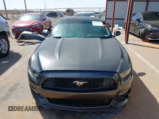 2015 Ford Mustang V6 with VIN 1FA6P8AM5F5318400, listed as a IAAI auction lot 41812625 with 97,728 mi miles and . Bid and sale history available at DreamBid. Image 12.