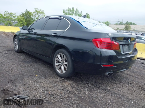 2014 BMW 5 Series 528i xDrive with VIN WBA5A7C54ED613352, listed as a IAAI auction lot 42197717 with 205,889 mi miles and . Bid and sale history available at DreamBid. Image 3.