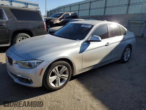 2016 BMW 3 Series with VIN WBA8F1C57GK438945, listed as a Copart auction lot 49090955 with 176,869 mi miles and Salvage title. Bid and sale history available at DreamBid. Image 1.