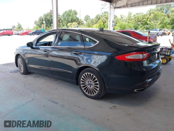 2016 Ford Fusion Titanium with VIN 3FA6P0K99GR235692, listed as a IAAI auction lot 42587743 with 169,467 mi miles and . Bid and sale history available at DreamBid. Image 3.