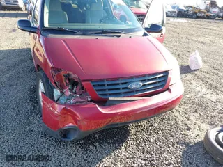 2005 Ford Freestar Wagon SES with VIN 2FMZA57645BA50977, listed as a IAAI auction lot 41540023 with 149,319 mi miles. Bid and sale history available at carsss.com. Image 6.