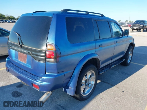 2003 Mitsubishi Montero XLS z VIN JA4MT31R13J045223, wystawiony jako IAAI lot #42208271 z przebiegiem 188 068 mil mil oraz . Historia ofert i sprzedaży dostępna na DreamBid. Obrazek 4.