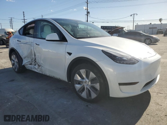 2024 Tesla Model Y Long Range with VIN 7SAYGDEE6RA261884, listed as a Copart auction lot 47639025 with 23,377 mi miles and Salvage Title. Bid and sale history available at DreamBid. Image 4.