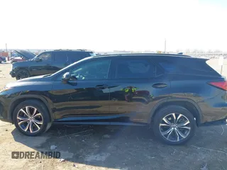 2018 Lexus RX 450hL Premium z VIN JTJDGKCA1J2004770, wystawiony jako IAAI lot #41329524 z przebiegiem 86 774 mil mil oraz . Historia ofert i sprzedaży dostępna na DreamBid. Obrazek 14.