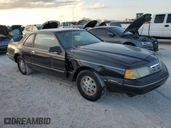 1988 Ford Thunderbird with VIN 1FABP60F9JH246775, listed as a Copart auction lot 77428264 with Not Provided miles and Salvage Title. Bid and sale history available at DreamBid. Image 4.
