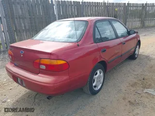 2001 Chevrolet Prizm with VIN 1Y1SK52891Z422344, listed as a IAAI auction lot 42095405 with 57,891 mi miles. Bid and sale history available at carsss.com. Image 4.