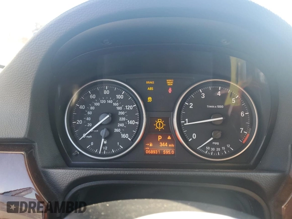 2012 BMW 3 Series 328i xDrive with VIN WBAUU3C53CA543482, listed as a Copart auction lot 77783264 with 68,931 mi miles and Salvage Title. Bid and sale history available at DreamBid. Image 9.