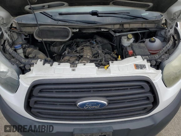 2015 Ford Transit Cargo z VIN 1FTNR1CG0FKA53031, wystawiony jako Copart lot #57058125 z przebiegiem 158 378 mil mil oraz Szkoda całkowita • Salvage title. Historia ofert i sprzedaży dostępna na DreamBid. Obrazek 12.