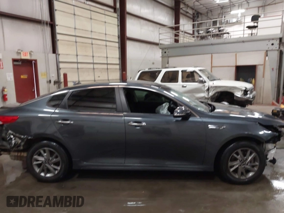 2019 Kia Optima LX with VIN 5XXGT4L33KG375854, listed as a IAAI auction lot 42235507 with 87,789 mi miles and . Bid and sale history available at DreamBid. Image 14.
