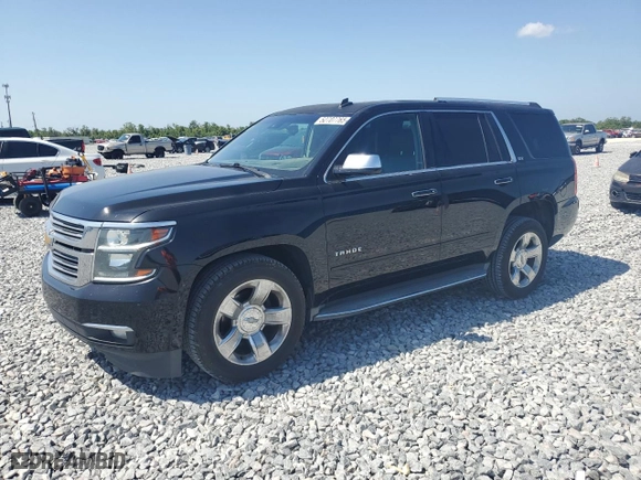2015 Chevrolet Tahoe LTZ with VIN 1GNSCCKC9FR215932, listed as a Copart auction lot 52707765 with 232,801 mi miles and Clean Title. Bid and sale history available at carsss.com. Image 1.