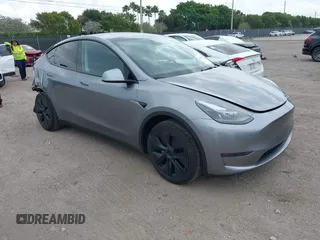 2025 Tesla Model Y Long Range with VIN 7SAYGDED5SF257258, listed as a IAAI auction lot 41877196 with 4,442 mi miles and . Bid and sale history available at DreamBid. Image 1.