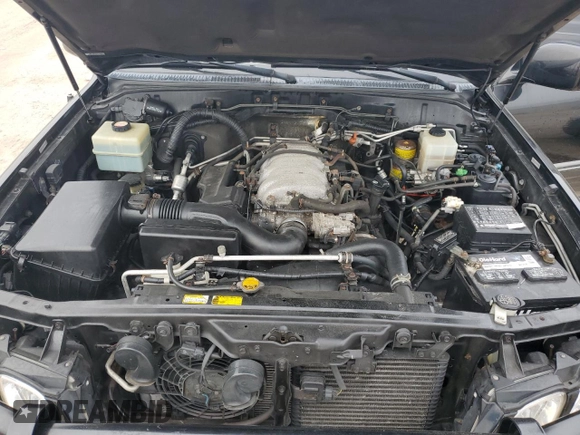 2001 Lexus LX 470 z VIN JTJHT00W513509447, wystawiony jako Copart lot #43988595 z przebiegiem 251 861 mil mil oraz Tytuł czysty. Historia ofert i sprzedaży dostępna na DreamBid. Obrazek 12.