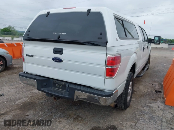 2014 Ford F-150 XL with VIN 1FTFW1ET8EFB33627, listed as a IAAI auction lot 42170252 with 173,886 mi miles. Bid and sale history available at carsss.com. Image 4.