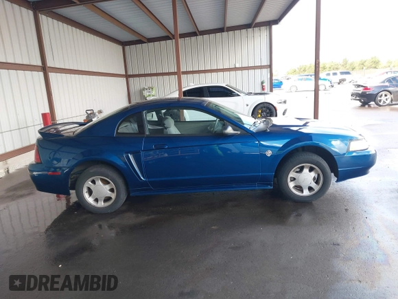 1999 Ford Mustang with VIN 1FAFP4040XF124637, listed as a IAAI auction lot 41793662 with 54,591 mi miles and . Bid and sale history available at DreamBid. Image 13.