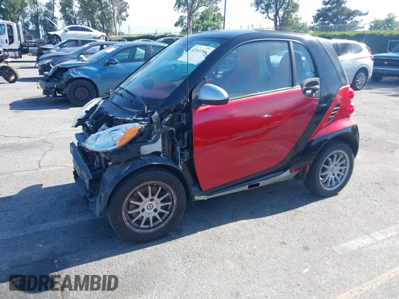 2013 Smart fortwo Pure z VIN WMEEJ3BAXDK632221, wystawiony jako IAAI lot #42243706 z przebiegiem 75 815 mil mil oraz . Historia ofert i sprzedaży dostępna na DreamBid. Obrazek 2.