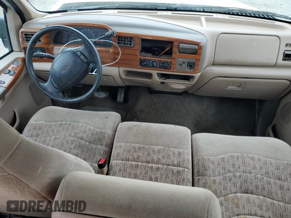 1999 Ford F-250 XL with VIN 1FTNX20S1XEB68189, listed as a Copart auction lot 60920605 with 209,822 mi miles and Salvage title. Bid and sale history available at DreamBid. Image 8.
