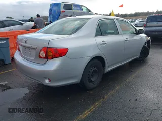 2009 Toyota Corolla with VIN 1NXBU40E39Z131392, listed as a IAAI auction lot 41194018 with 136,031 mi miles. Bid and sale history available at carsss.com. Image 4.