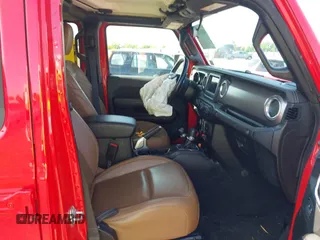 2021 Jeep Wrangler Unlimited Rubicon with VIN 1C4HJXFG2MW575541, listed as a IAAI auction lot 42247475 with 92,353 mi miles and . Bid and sale history available at DreamBid. Image 5.