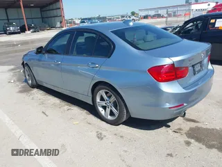 2014 BMW 3 Series 320i xDrive with VIN WBA3C3C59EF986353, listed as a IAAI auction lot 42383107 with 142,836 mi miles and . Bid and sale history available at DreamBid. Image 3.
