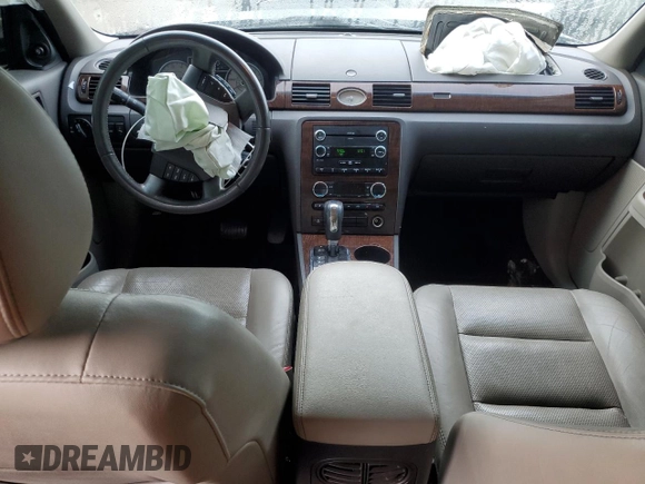 2009 Ford Taurus Limited z VIN 1FAHP25WX9G101791, wystawiony jako Copart lot #56671645 z przebiegiem 120 918 mil mil oraz Nie do naprawy • Non repairable. Historia ofert i sprzedaży dostępna na DreamBid. Obrazek 8.