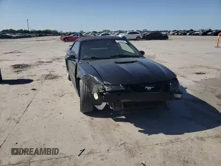 1999 Ford Mustang GT z VIN 1FAFP45X5XF224042, wystawiony jako Copart lot #52966565 z przebiegiem 145 862 mil mil oraz Szkoda całkowita • Salvage title. Historia ofert i sprzedaży dostępna na DreamBid. Obrazek 11.