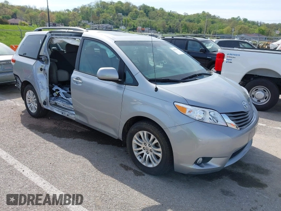 2014 Toyota Sienna XLE with VIN 5TDYK3DC0ES451307, listed as a IAAI auction lot 42093569 with 105,721 mi miles and . Bid and sale history available at DreamBid. Image 1.