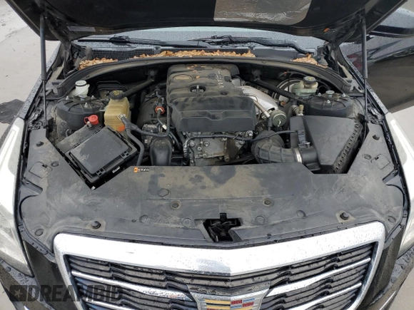 2018 Cadillac ATS RWD z VIN 1G6AA5RX4J0184510, wystawiony jako Copart lot #42934545 z przebiegiem 104 677 mil mil oraz Szkoda całkowita • Salvage title. Historia ofert i sprzedaży dostępna na DreamBid. Obrazek 13.