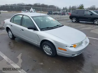 2002 Saturn SL with VIN 1G8ZH52872Z262235, listed as a IAAI auction lot 41424144 with 164,498 mi miles. Bid and sale history available at carsss.com. Image 1.