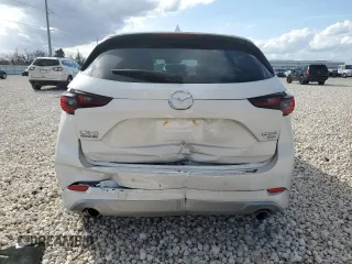 2024 Mazda CX-5 2.5 Turbo Signature with VIN JM3KFBXY7R0518304, listed as a Copart auction lot 42788985 with 8,593 mi miles and Salvage Title. Bid and sale history available at carsss.com. Image 6.