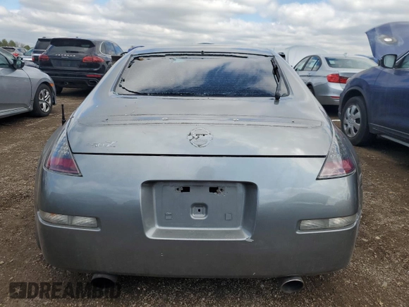 2003 Nissan 350Z Touring z VIN JN1AZ34E23T003943, wystawiony jako Copart lot #55221405 z przebiegiem 198 292 mil mil oraz Szkoda całkowita • Salvage title. Historia ofert i sprzedaży dostępna na DreamBid. Obrazek 6.
